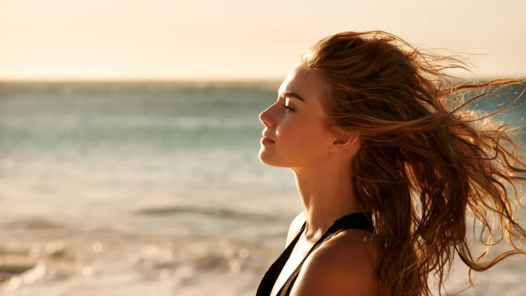 Female with long hair at beach